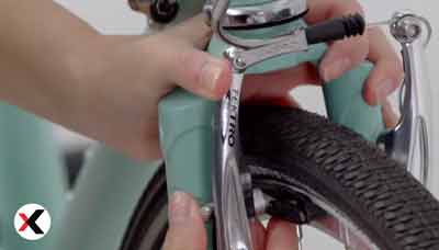 how to tighten up brakes on a bike