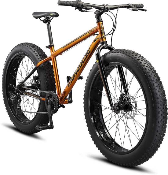 Close view of wide fat tires on mountain bike