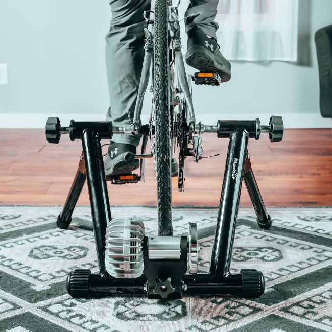 Alpcour foldable fluid bicycle trainer with progressive resistance for road and mountain bikes